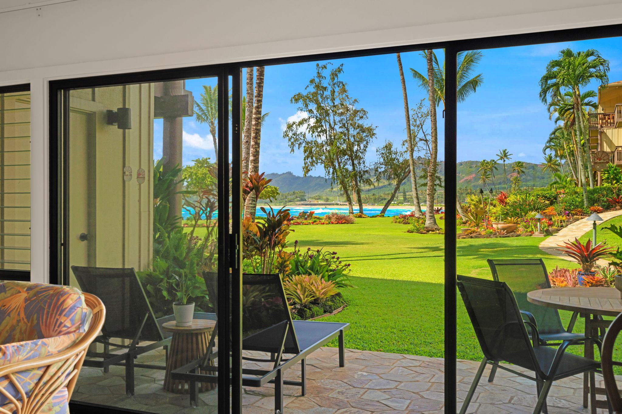 410 Papaloa Road, Unit 316 Kapaa, HI 96746 - Photo 3 of 30 a view of an chairs and table in patio