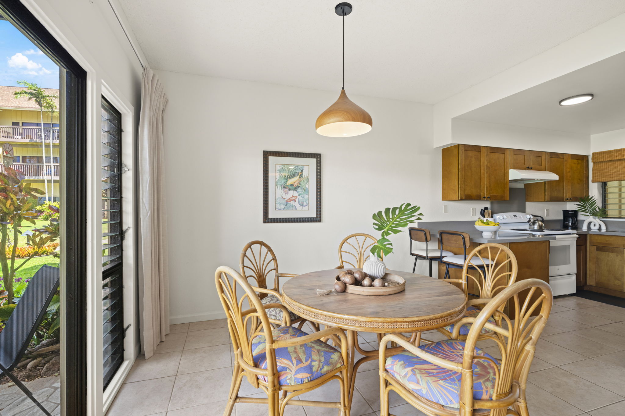 410 Papaloa Road, Unit 316 Kapaa, HI 96746 - Photo 8 of 30 a view of a dining room with furniture window and outside view