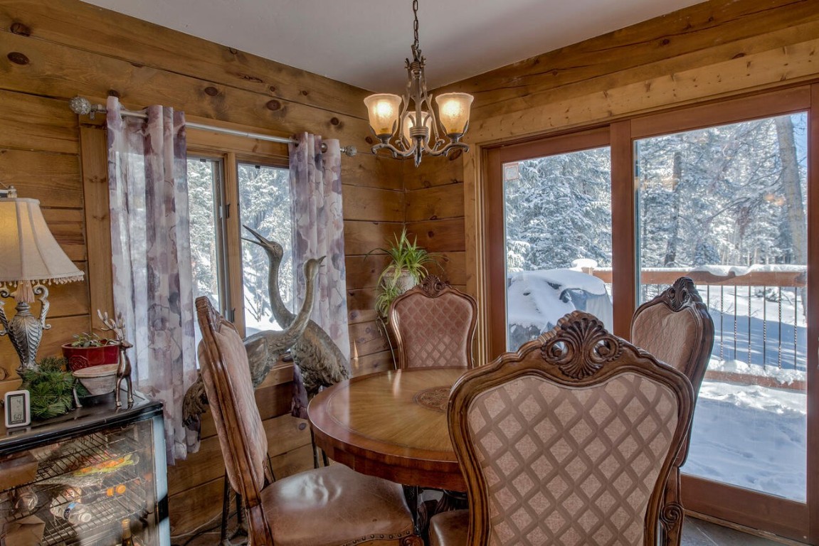229 Lee Lane Breckenridge, CO 80424 - Photo 11 of 49 a view of a dining room with furniture window and outside view