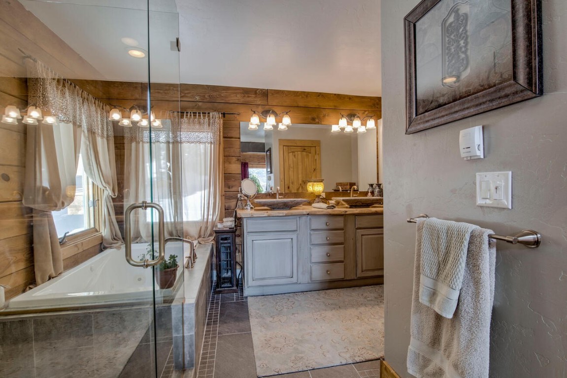 229 Lee Lane Breckenridge, CO 80424 - Photo 19 of 49 a kitchen with refrigerator and cabinets