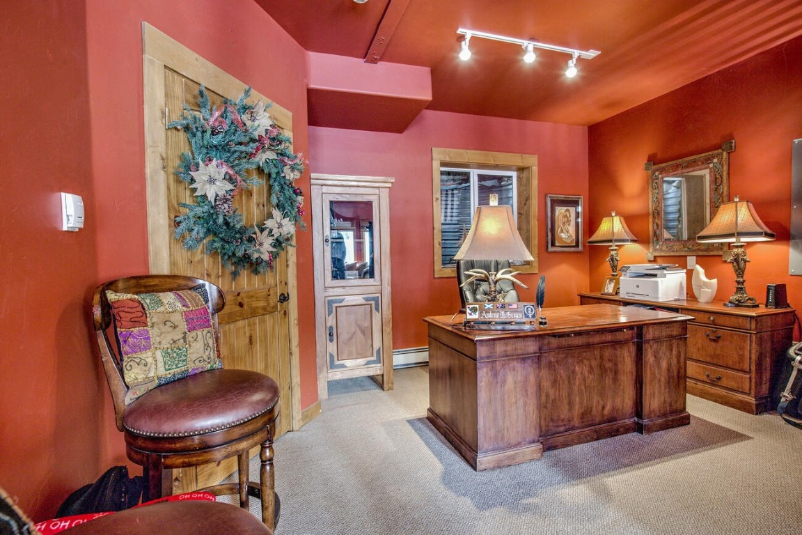 229 Lee Lane Breckenridge, CO 80424 - Photo 24 of 49 a view of a dining room with furniture and chandelier