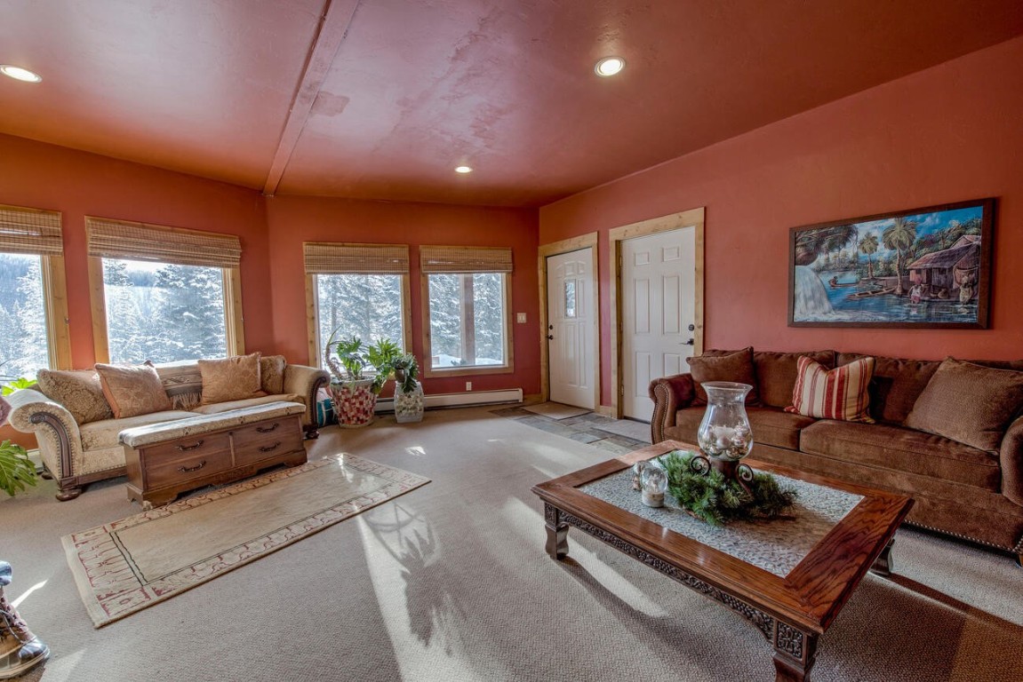 229 Lee Lane Breckenridge, CO 80424 - Photo 28 of 49 a living room with furniture and a large window