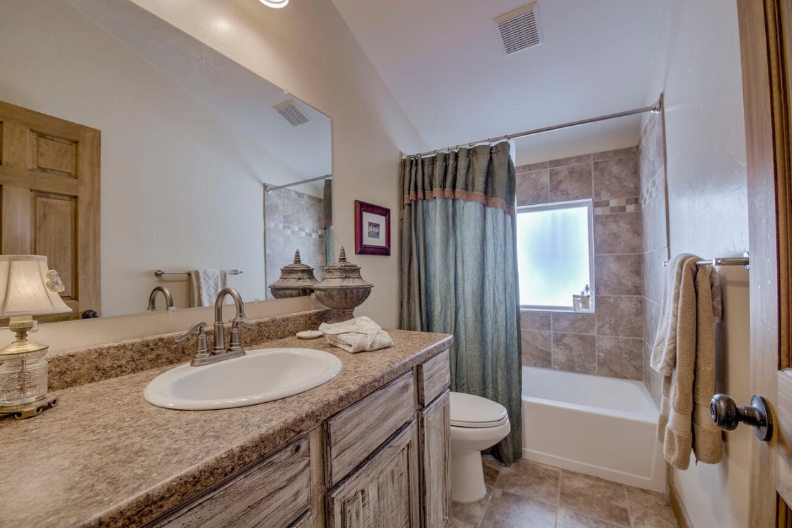 229 Lee Lane Breckenridge, CO 80424 - Photo 34 of 49 a bathroom with a granite countertop sink toilet and shower