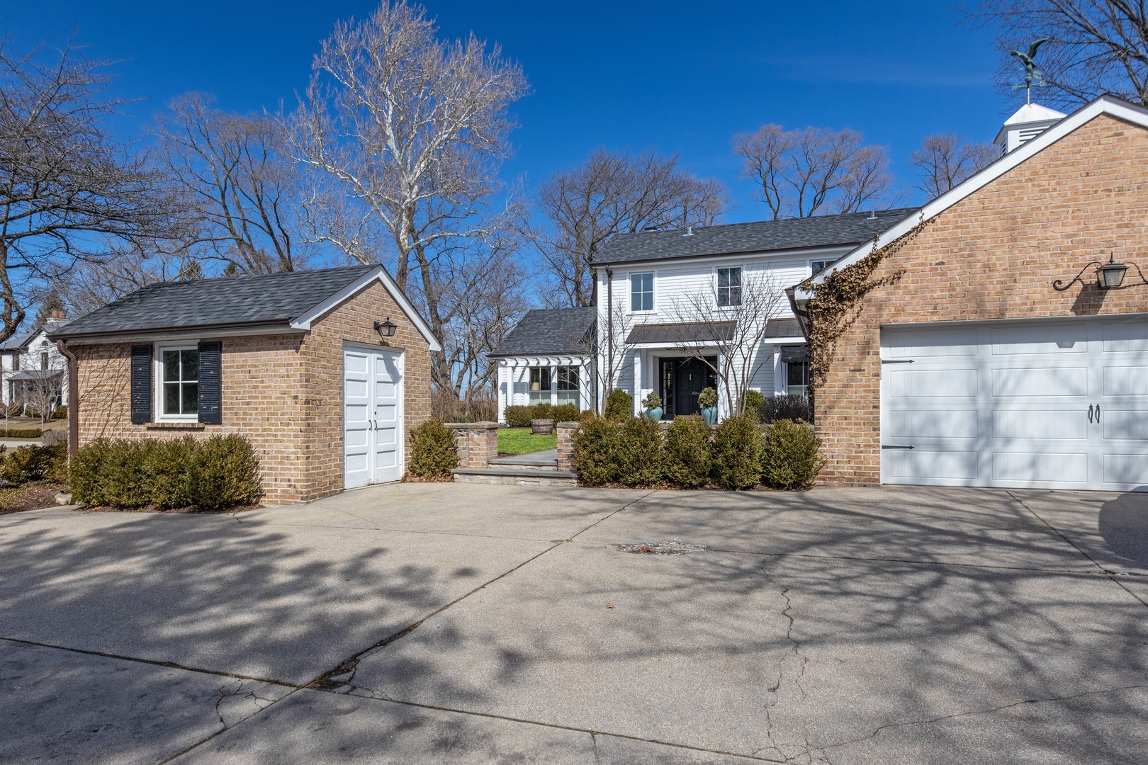 453 Sheridan Road Winnetka, IL 60093 - Photo 2 of 15 a view of a house with a patio