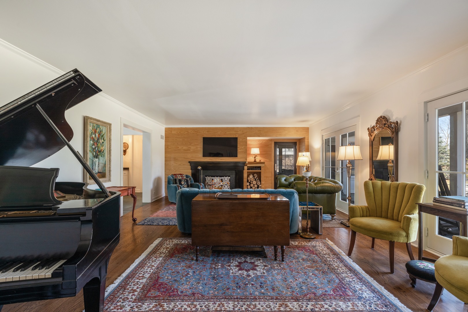 453 Sheridan Road Winnetka, IL 60093 - Photo 7 of 15 a living room with furniture and a flat screen tv