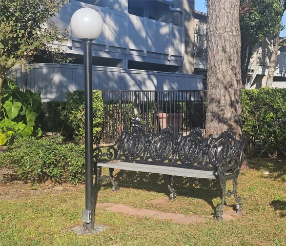 a view of wooden floor and windows in a room