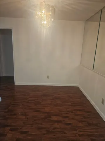 a kitchen with stainless steel appliances granite countertop a sink refrigerator and microwave