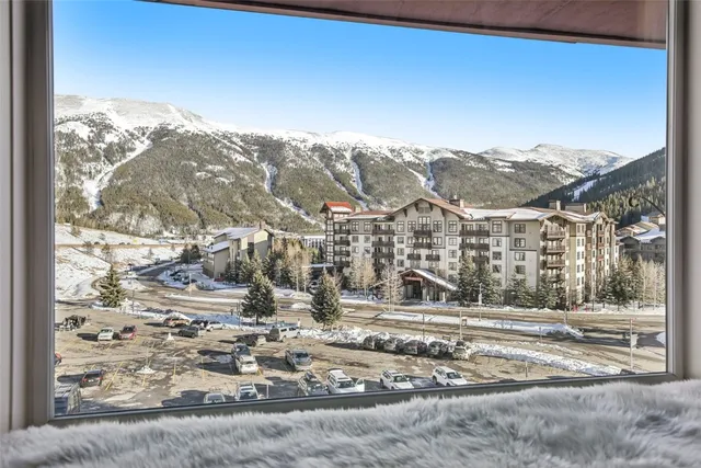 a view of a house with a mountain
