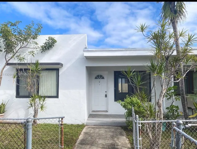 a front view of a house with a porch