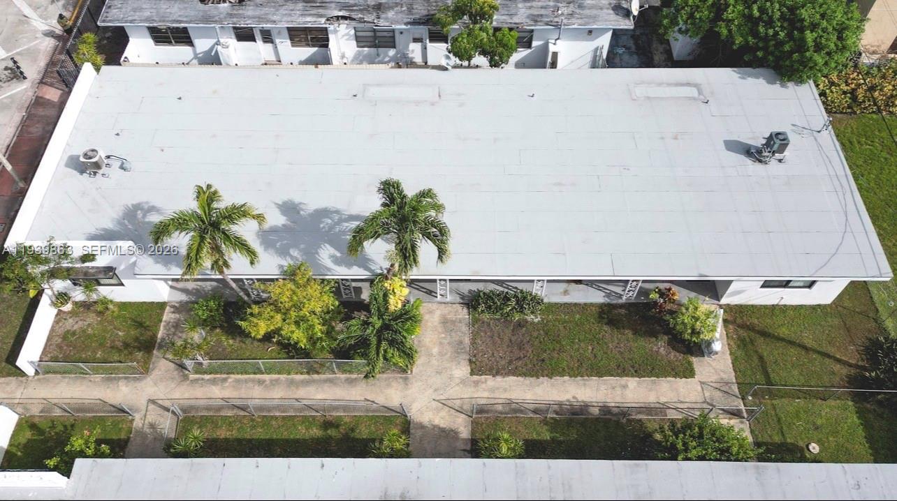 650 83rd Street, Unit 1 Miami Beach, FL 33141 - Photo 6 of 37 an aerial view of a house with a yard