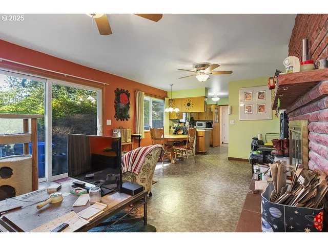 a kitchen that has a lot of cabinets a sink and a stove in it