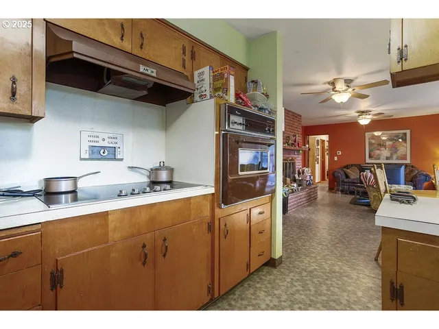 a bedroom with a bed and a table