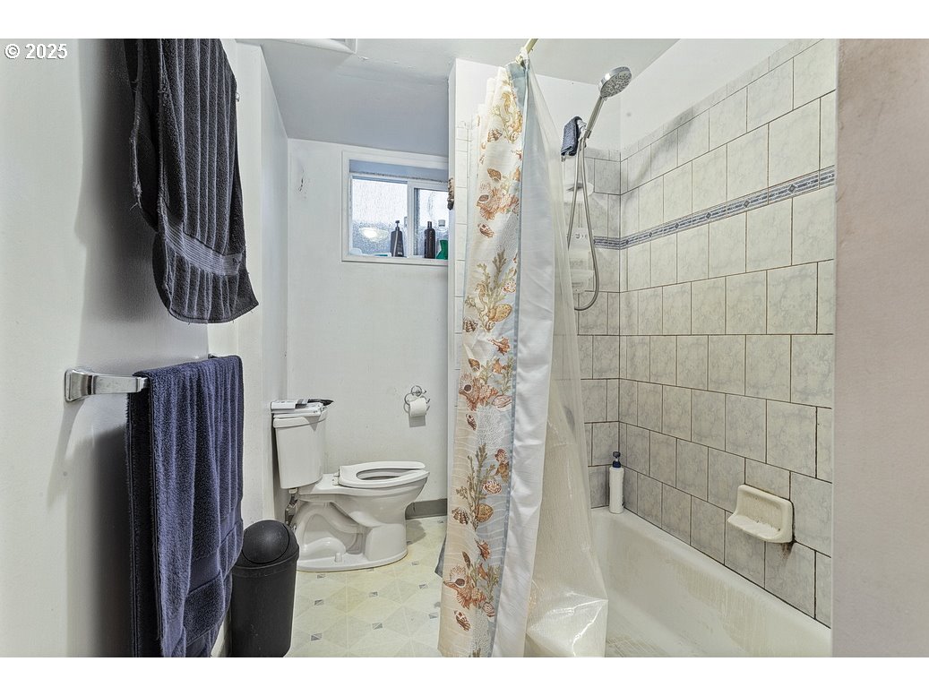 205 Northeast 160th Avenue Portland, OR 97230 - Photo 18 of 35 a bathroom with a toilet and a shower