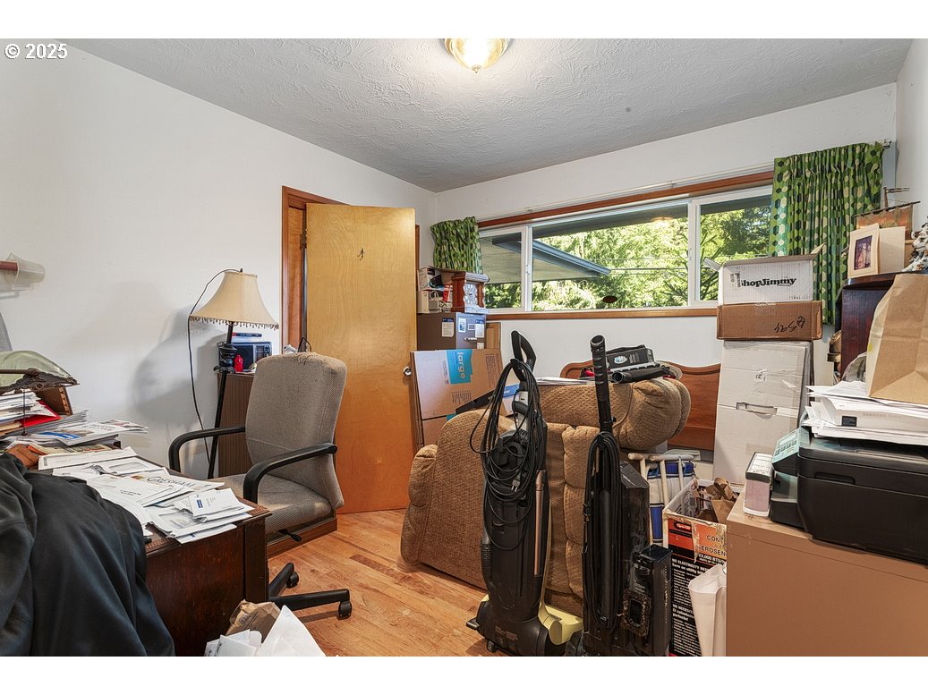 205 Northeast 160th Avenue Portland, OR 97230 - Photo 22 of 35 a view of a workspace with furniture and a window