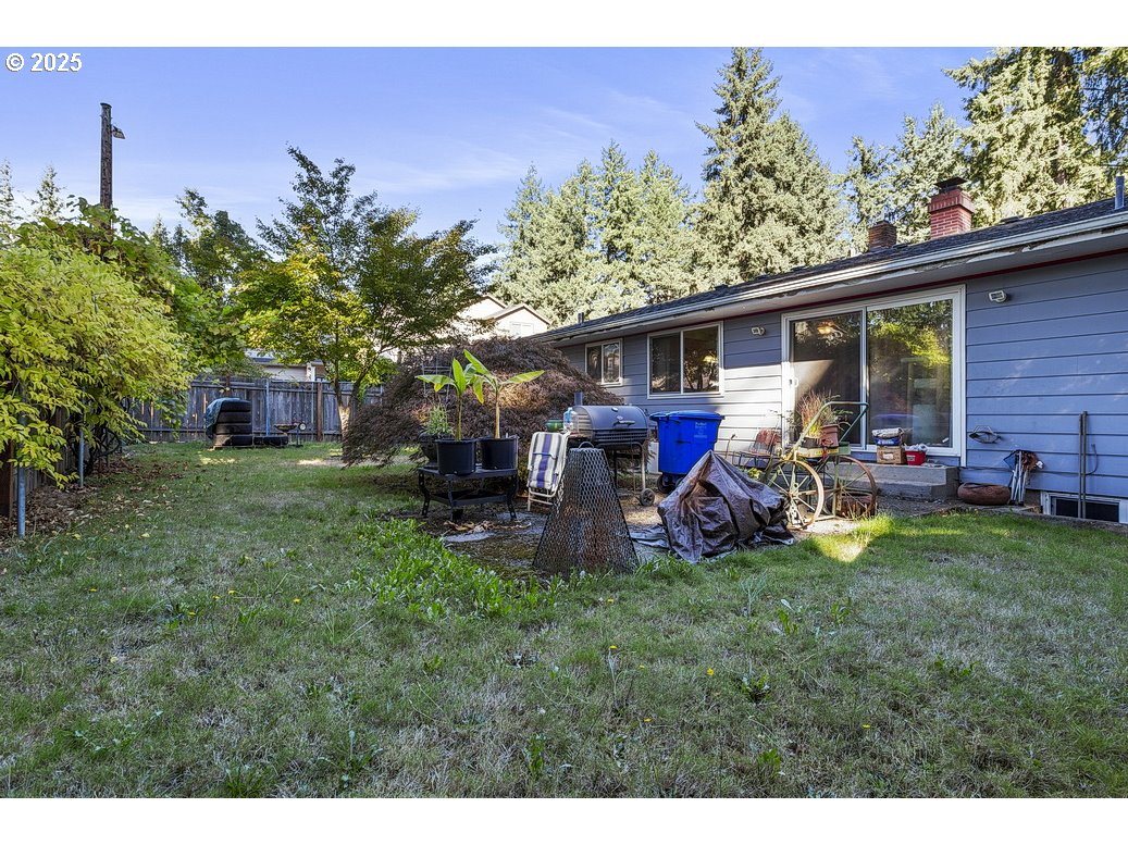 205 Northeast 160th Avenue Portland, OR 97230 - Photo 33 of 35 a view of a house with backyard porch and sitting area