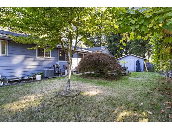 a backyard of a house with lots of green space