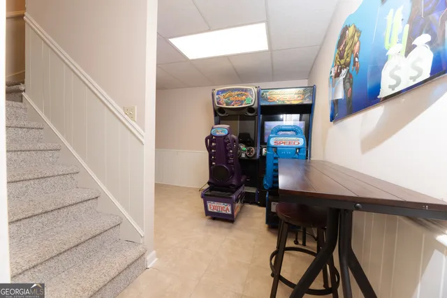 a living room with furniture and a table