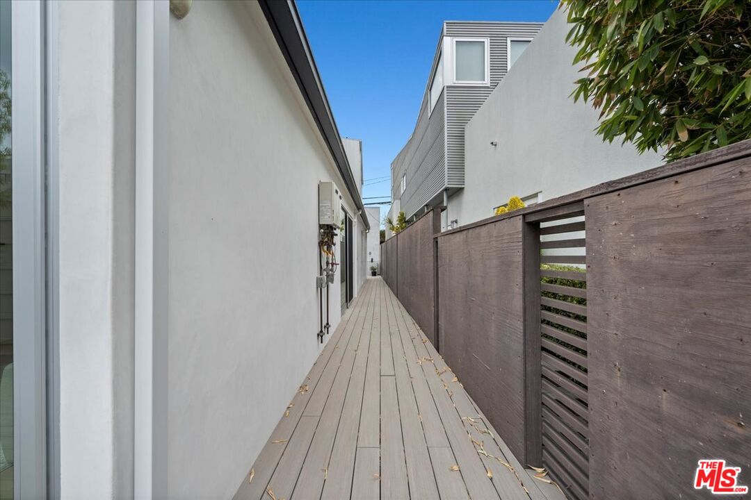 541 Rose Avenue, Unit LOFT Venice, CA 90291 - Photo 4 of 13 a view of stairs with wooden floor