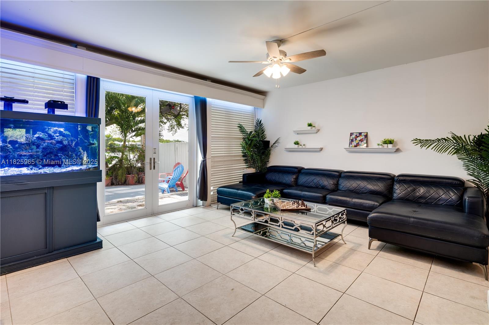 5292 Southwest 69th Place Miami, FL 33155 - Photo 11 of 37 a living room with furniture and wooden floor