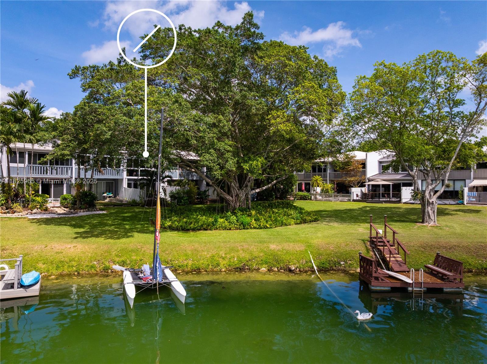 5292 Southwest 69th Place Miami, FL 33155 - Photo 36 of 37 a view of a lake with a house in the background
