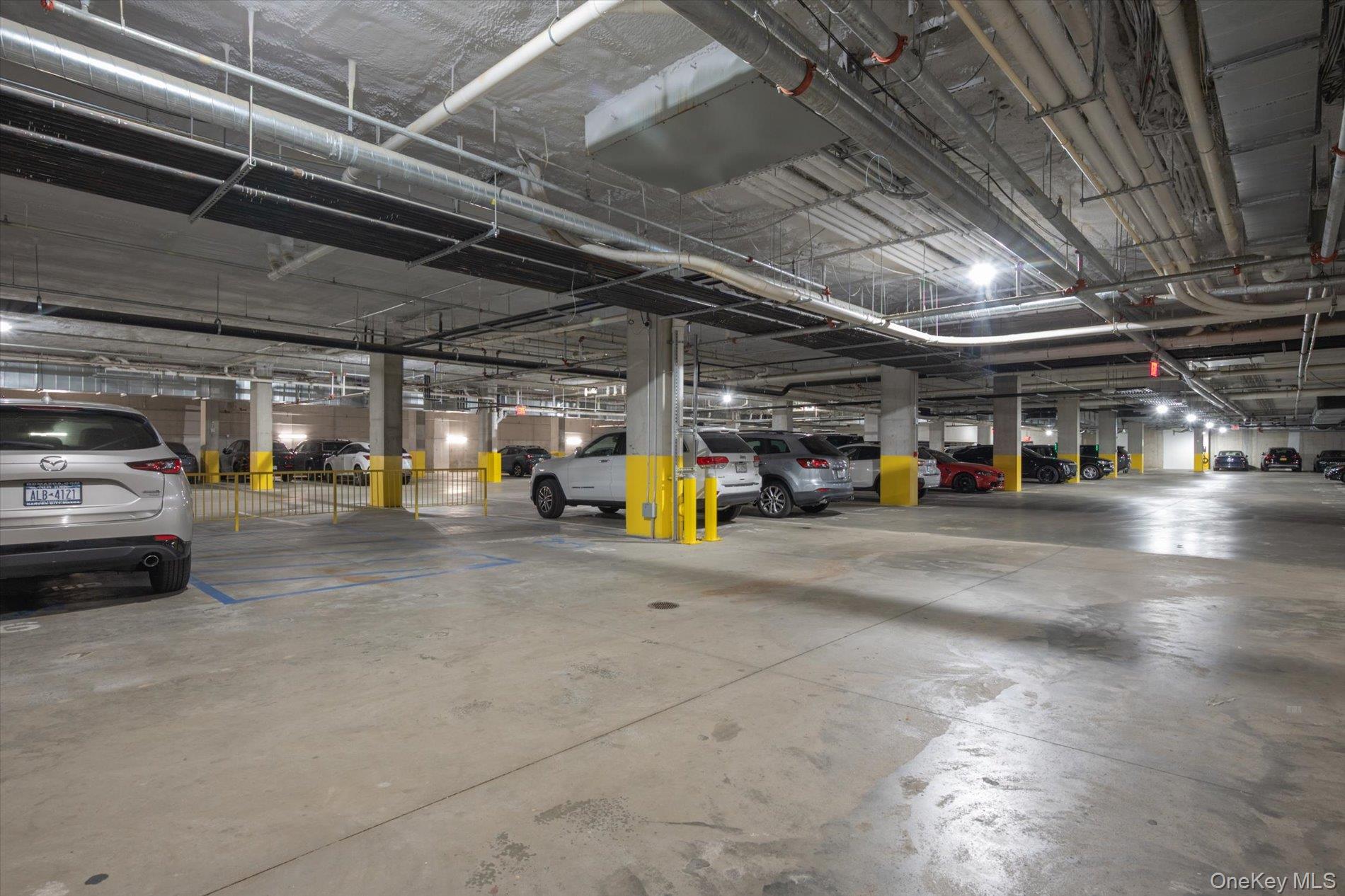 100 Garvies Point Road, Unit 1042 Glen Cove, NY 11542 - Photo 33 of 33 View of parking deck