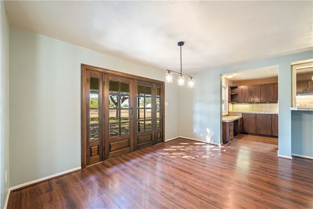 a kitchen with a sink and a window