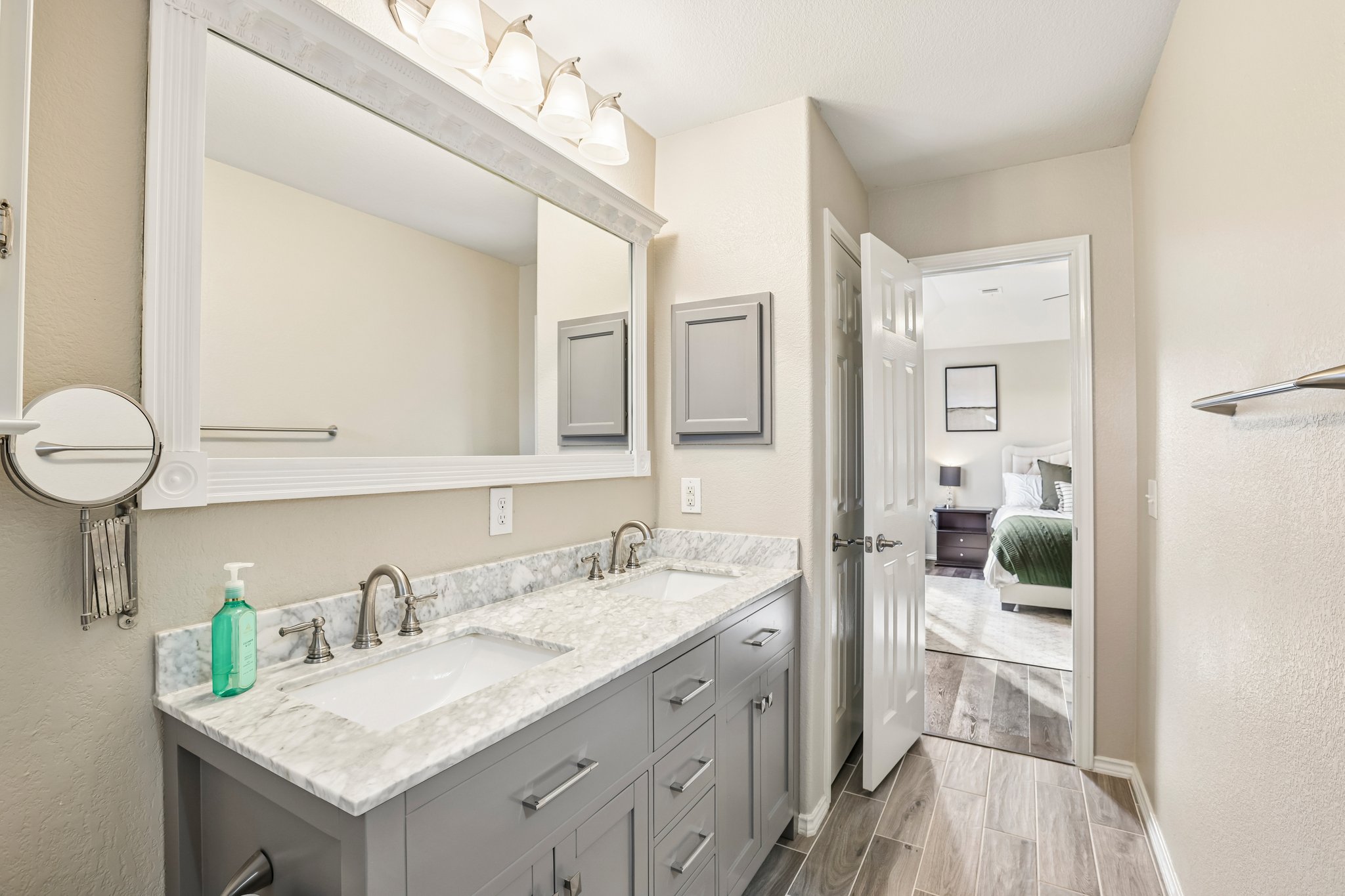 5508 Emma Thompson Way Austin, TX 78747 - Photo 25 of 34 Spacious primary bathroom features a dual vanity and is light and bright.