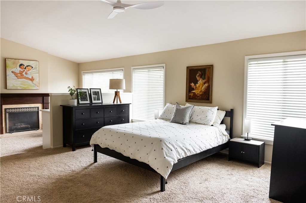 26251 Brookhollow Lake Forest, CA 92630 - Photo 12 of 27 a bedroom with a bed dresser and a window