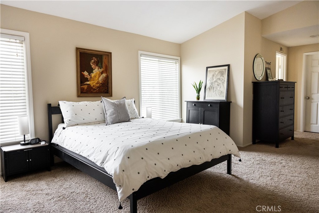 26251 Brookhollow Lake Forest, CA 92630 - Photo 13 of 27 a bedroom with a bed and a dresser