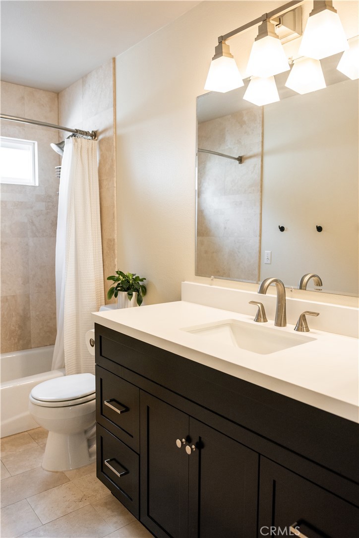 26251 Brookhollow Lake Forest, CA 92630 - Photo 18 of 27 a bathroom with a sink and a mirror