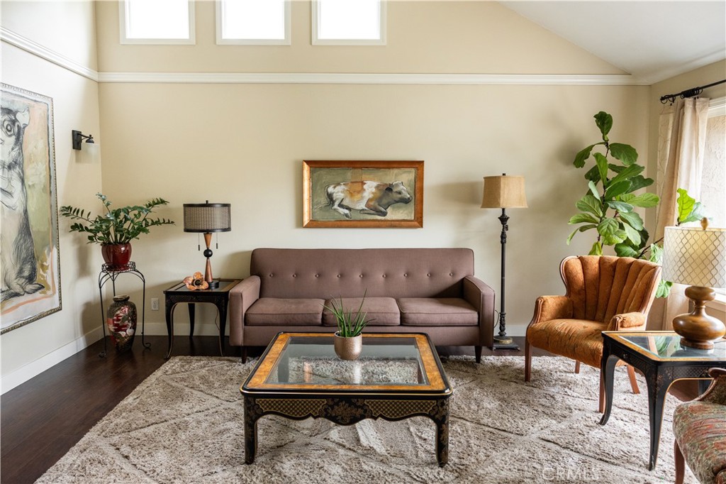 26251 Brookhollow Lake Forest, CA 92630 - Photo 2 of 27 a living room with furniture and a rug