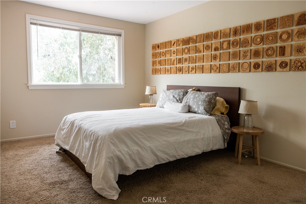 26251 Brookhollow Lake Forest, CA 92630 - Photo 21 of 27 a bedroom with a bed and a window