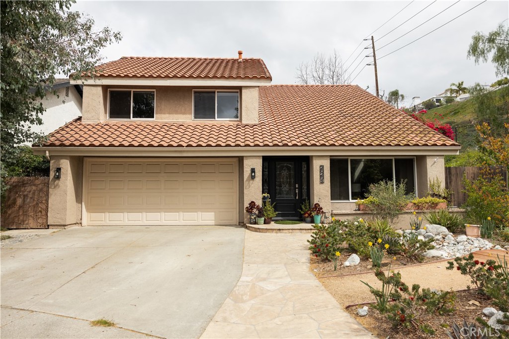 26251 Brookhollow Lake Forest, CA 92630 - Photo 25 of 27 a front view of a house with a yard