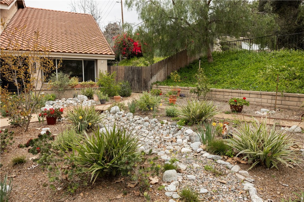 26251 Brookhollow Lake Forest, CA 92630 - Photo 27 of 27 a front view of a house with a yard