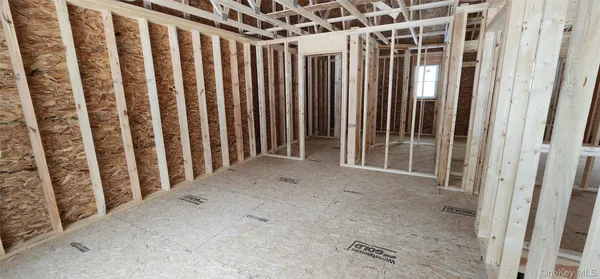 a view of a room with wooden frame
