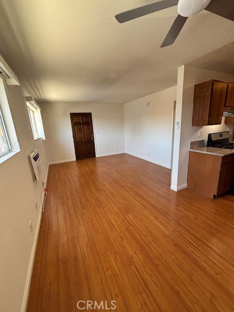 1901 Scott Road Burbank, CA 91504 - Photo 4 of 14 a bedroom with a bed and wooden floor