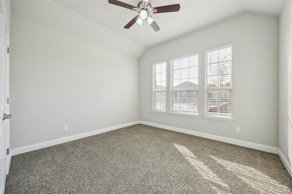 11520 Lavonia Road Fort Worth, TX 76244 - Photo 16 of 32 a view of an empty room with a window