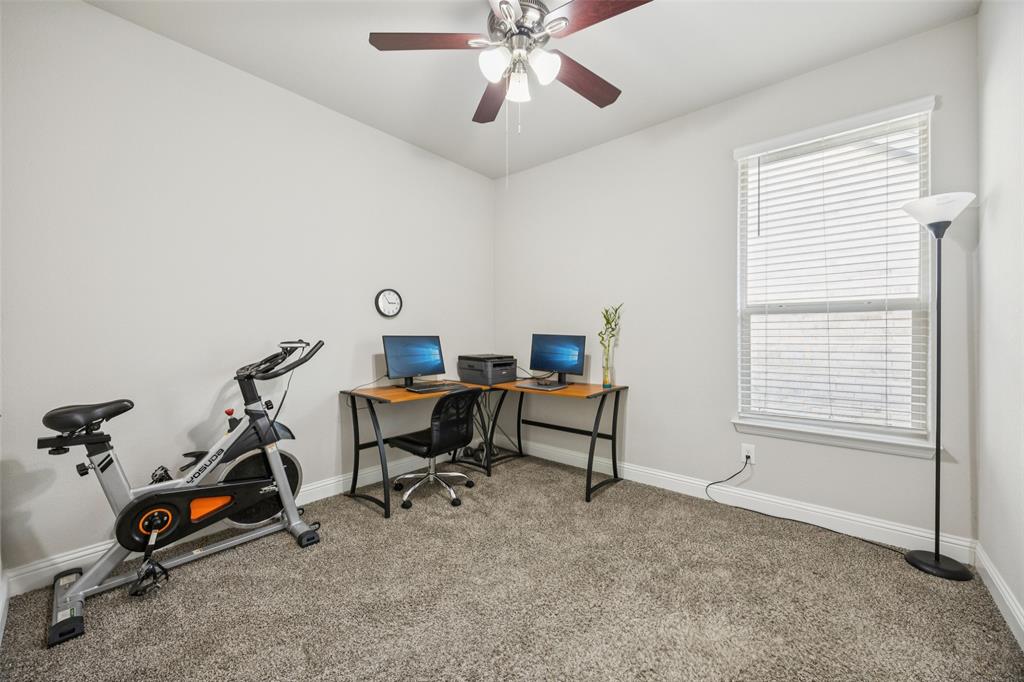 11520 Lavonia Road Fort Worth, TX 76244 - Photo 21 of 32 a view of a workspace with furniture and a window