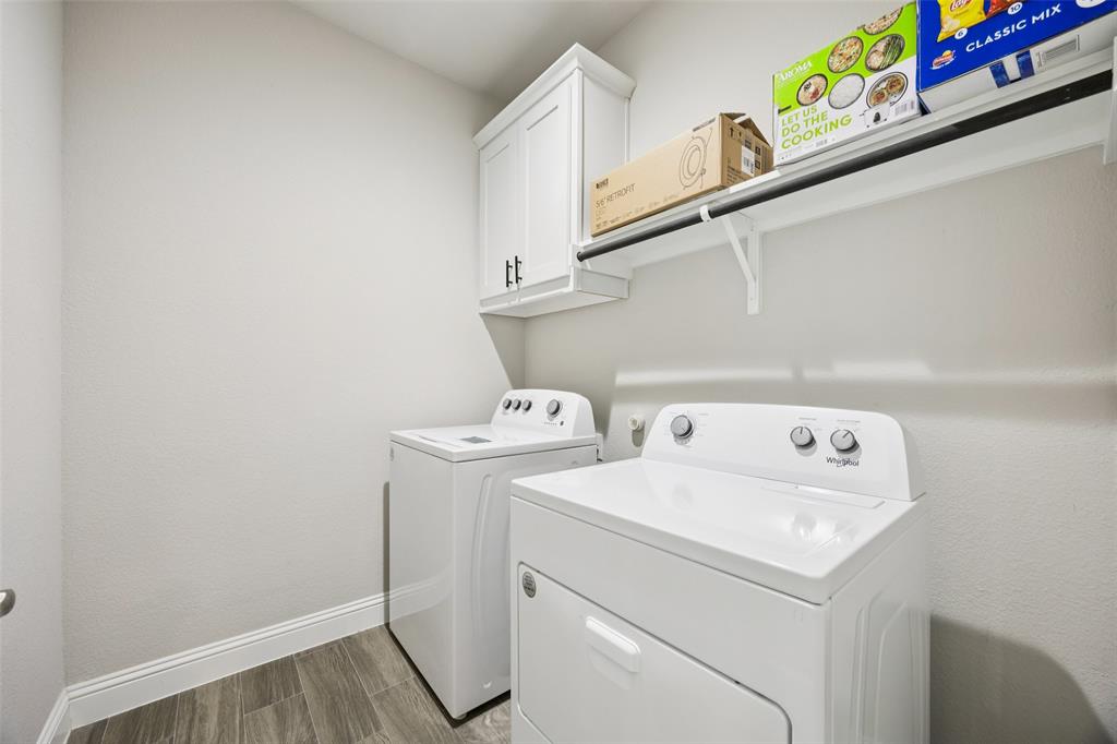 11520 Lavonia Road Fort Worth, TX 76244 - Photo 22 of 32 a utility room with dryer and washer