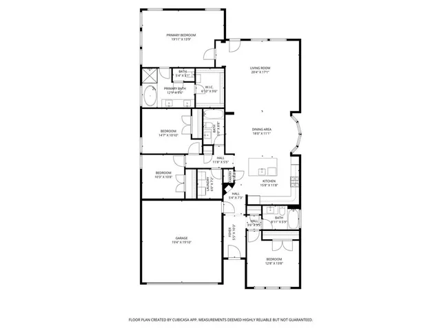 a utility room with a cabinet and mirror
