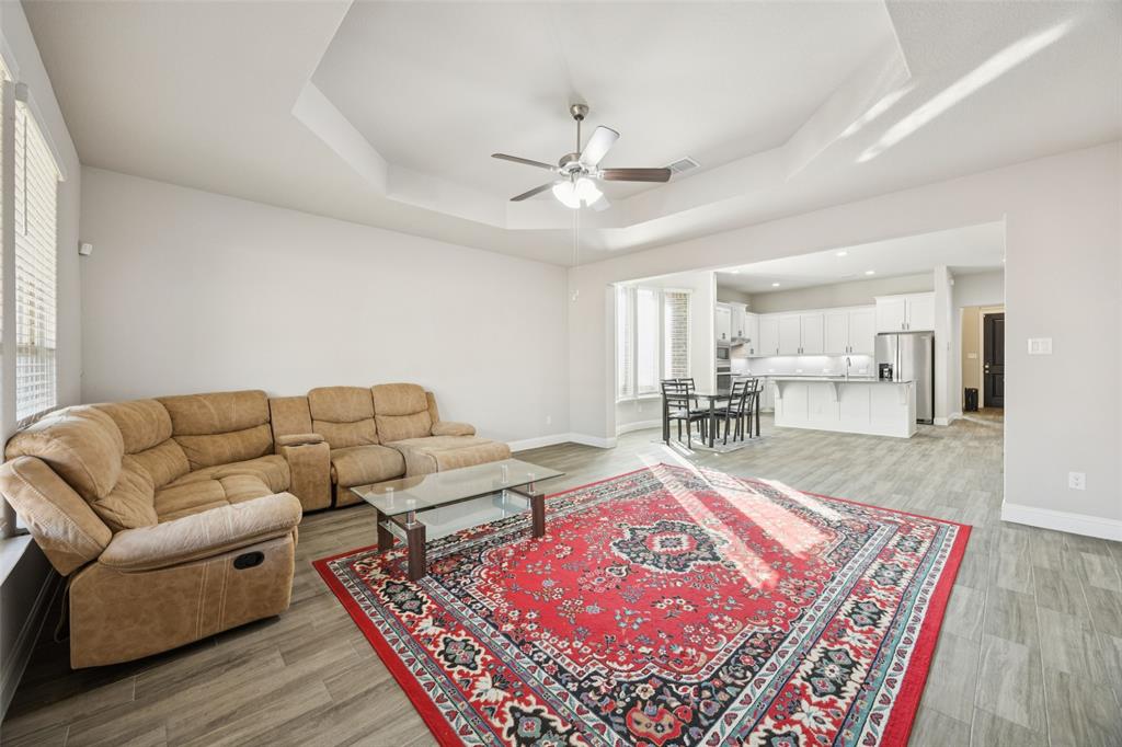 11520 Lavonia Road Fort Worth, TX 76244 - Photo 3 of 32 a living room with furniture and a rug