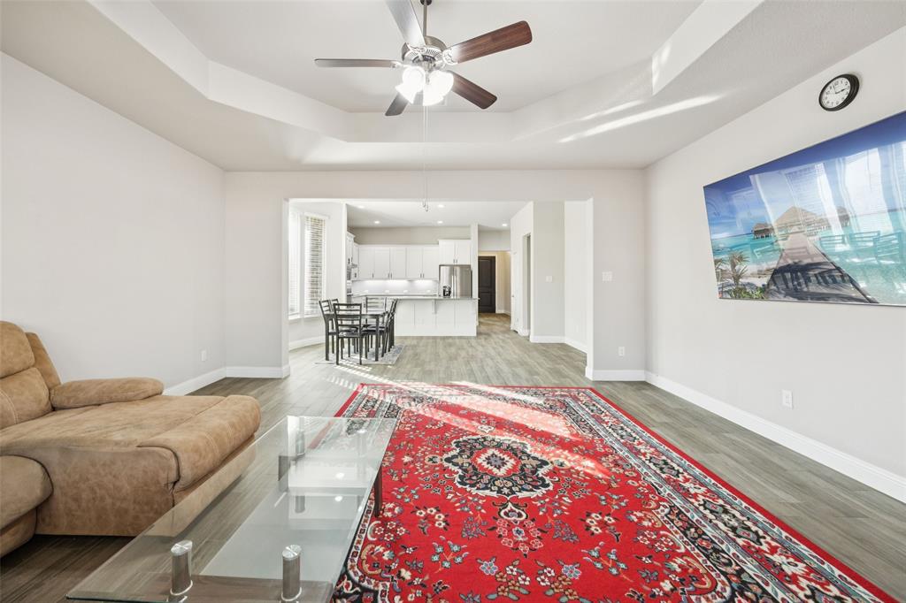 11520 Lavonia Road Fort Worth, TX 76244 - Photo 6 of 32 a living room with furniture and a rug