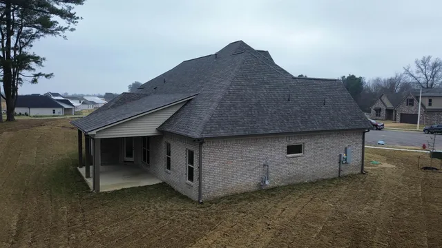 a bathroom with a tub a sink a mirror and a shower