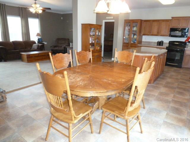 4375 Camp Creek Road Lancaster, SC 29720 - Photo 11 of 24 a view of a dining room with furniture