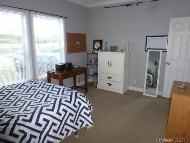 4375 Camp Creek Road Lancaster, SC 29720 - Photo 19 of 24 a bedroom with a bed and a window