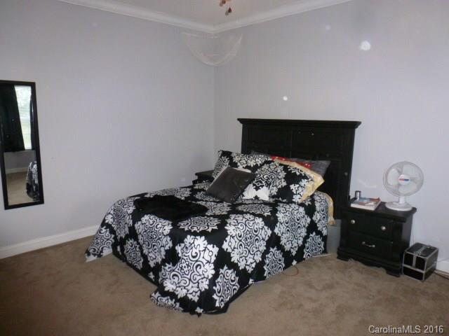 4375 Camp Creek Road Lancaster, SC 29720 - Photo 20 of 24 a bedroom with bed and window