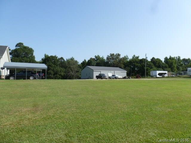 4375 Camp Creek Road Lancaster, SC 29720 - Photo 4 of 24 a front view of a house with a yard and trees