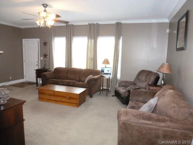 4375 Camp Creek Road Lancaster, SC 29720 - Photo 7 of 24 a living room with furniture and a large window