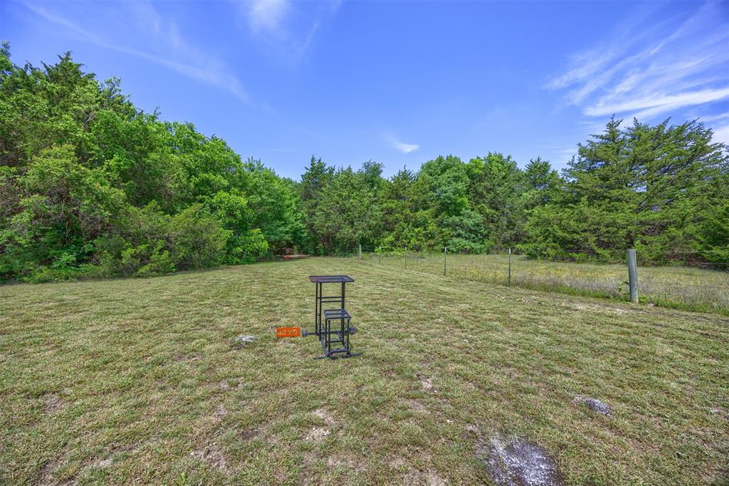 881 Wild Road Van Alstyne, TX 75495 - Photo 32 of 40 a view of a lake view