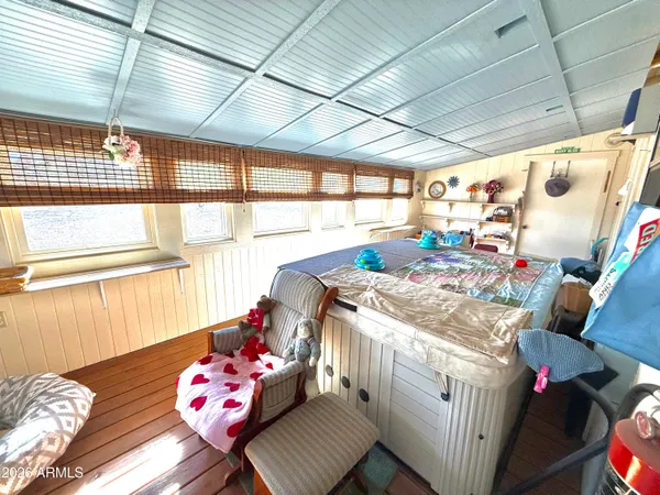 a very nice looking bedroom with a large window